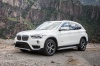 2019 BMW X1 xDrive28i in Alpine White from a front left three-quarter view